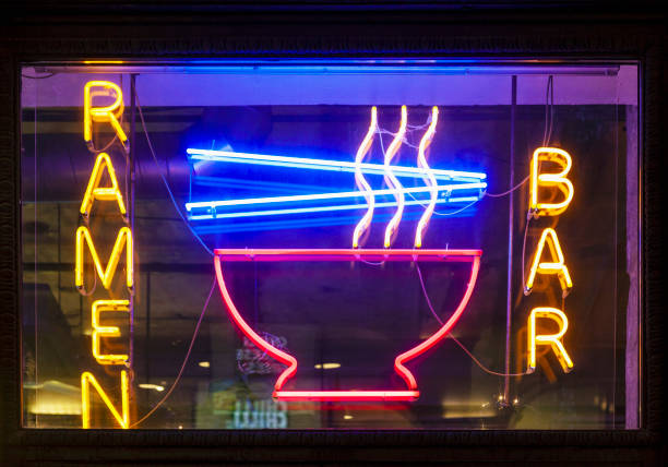 istock Ramen bar neon sign hanging outdoors and glowing 1197505628