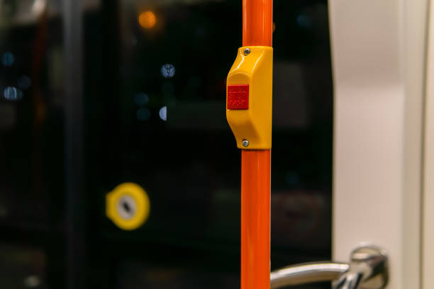 interior elements of public transport - button to signal the driver to stop - on a blurred background
