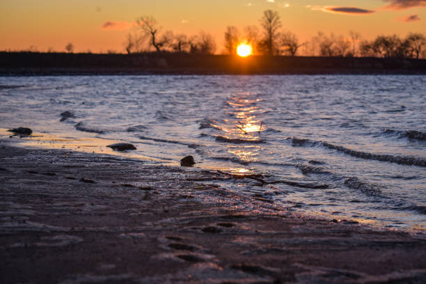 istock Sunset on the lake in winter 1197507664