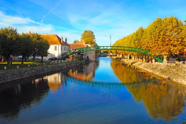 metal footbridge, built according to the Gustave Eiffel process, above the Briare canal, in Montargis, in the center-val-de-Loire region in the heart of France.