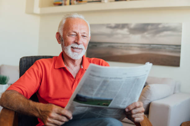 istock Senior man reading news papers 1197508707