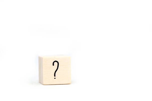 istock question mark on wood cube isolated on white background, symbol space for text 1197509561