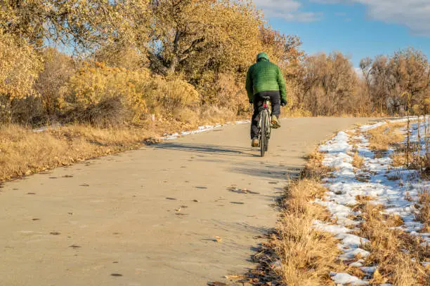 Winter or fall commuting on a bike trail - Poudre River Trail in northern Colorado