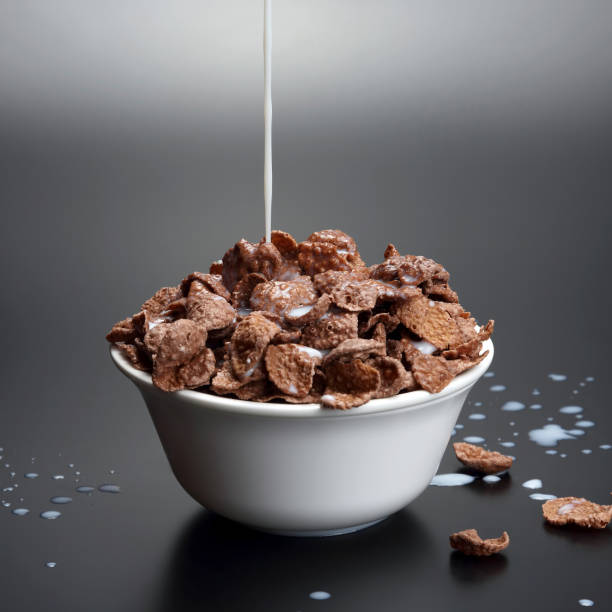 istock milk pouring in a bowl of corn flakes 1197516199