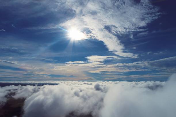 istock Drone flying above the clouds with beautiful sky. Great landscape. 1197517377