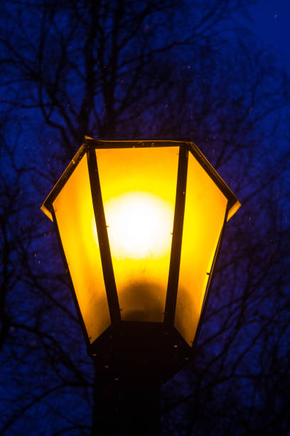 istock yellow lantern against the night sky 1197517715