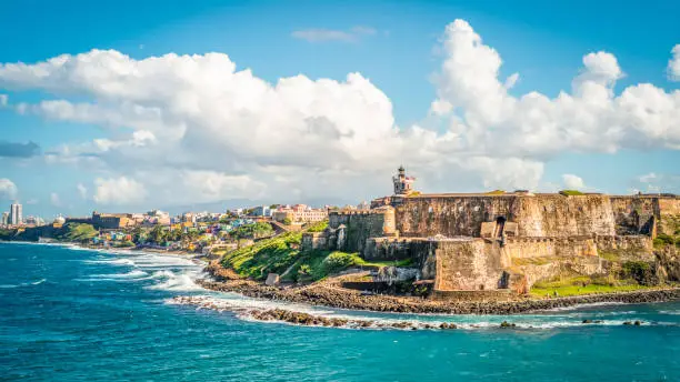 Photo of Panoramic landscape of historical castle El Morro along the coastline, San Juan, Puerto Rico.