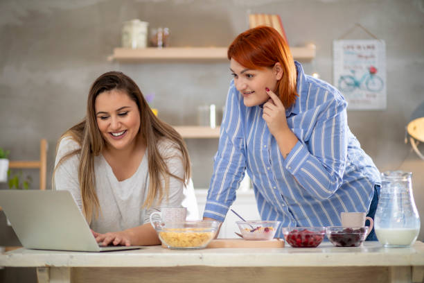 istock Young smiling plus size freelance women. 1197520438