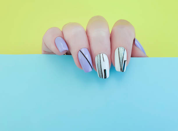 istock female hand nail manicure on a colored background 1197524207