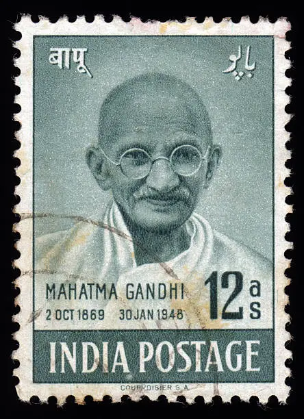 Vintage India postage stamp showing an engraved portait of Mahatma Gandhi