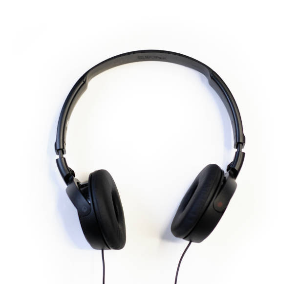 istock Classic black wired headphones on white background. Minimalistic music concept 1197526440