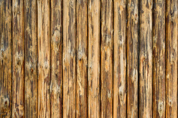 istock wooden pattern from vertical brown planks and old weathered dark brown background 1197526478