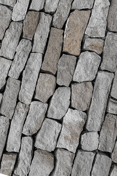 istock stone pattern gray cobblestone oblique background natural design closeup 1197529871