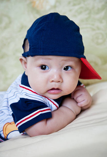 istock baby in a baseball cap 119753069