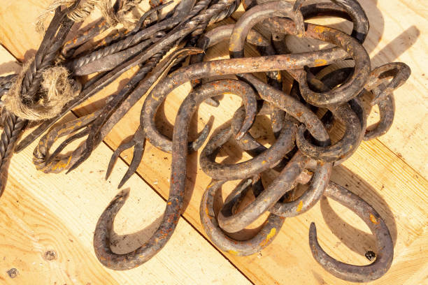 istock heap sharp metal hook forged rusty closeup many products background 1197531271
