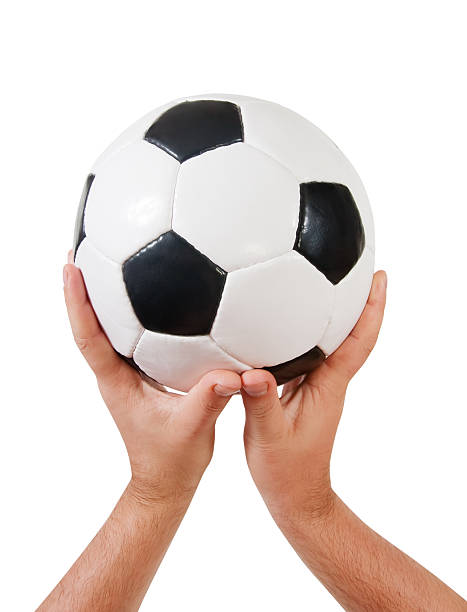 istock Hands holding football 119753252