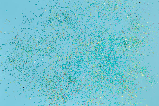 istock Beautiful blue holiday background with colored sequins 1197532942