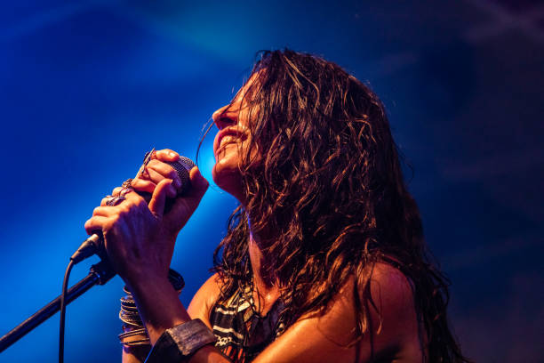 istock female singer performing on the stage 1197537243