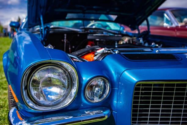 istock Old American muscle car half front side 1197537255