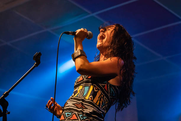 istock female singer performing on the stage 1197537350
