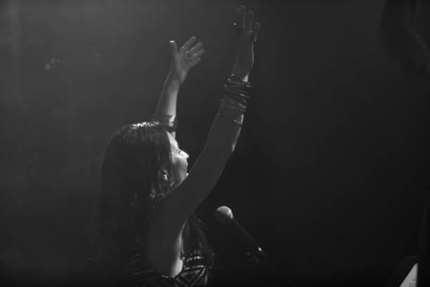 istock female singer performing on the stage 1197537370
