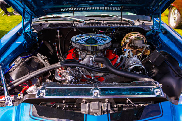 Classic car engine at a car show.