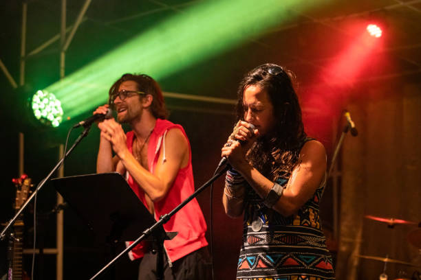 istock woman and man are singing on the stage 1197537456