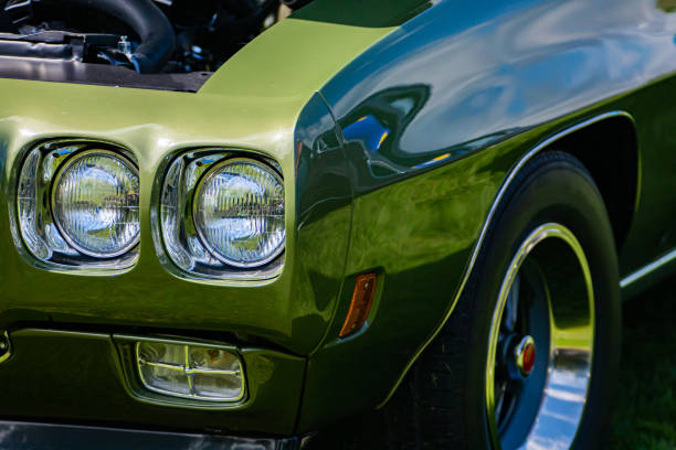 istock Old American muscle car half front side 1197537520