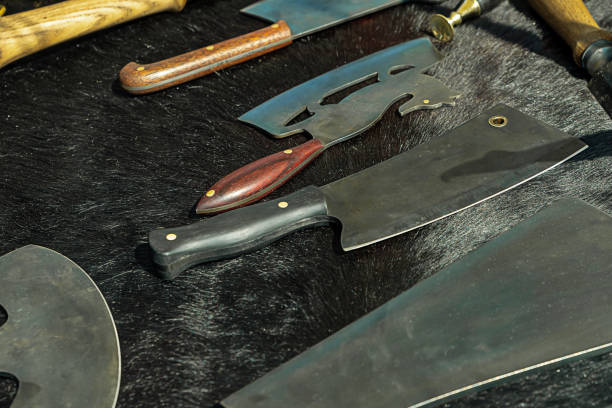 istock butcher ax knife kitchen shredder black handle set of tools culinary background black 1197538694