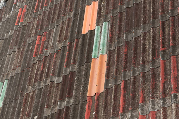 istock old rusty roof with bright plates red blue vertical pattern 1197539034