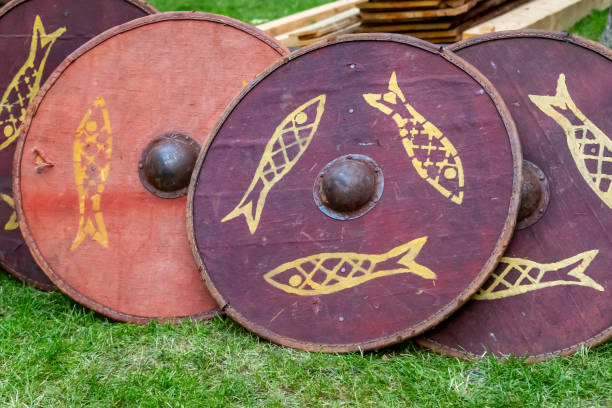 set of traditional wooden shields, round red patterned fish, disposable for ostentatious fights