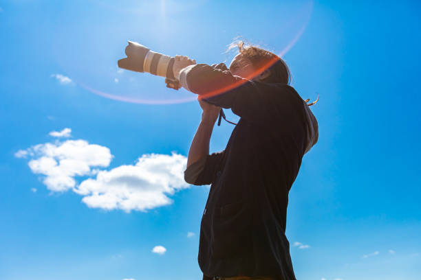 istock Male photographer shooting the sky 1197542171