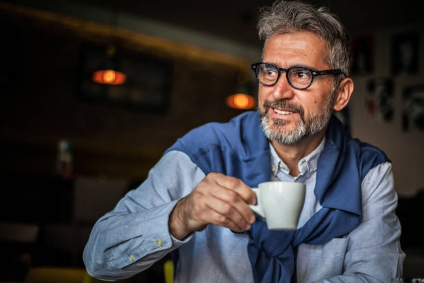 istock Mature businessman in a cafe 1197543234