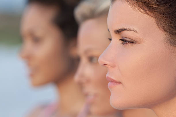 istock Three Beautiful Young Women In Profile 119754435