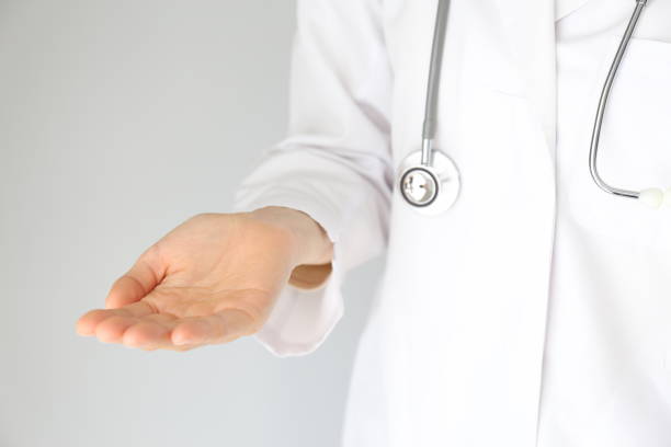 istock Medical image-gentle hands of a doctor 1197545021