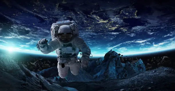 Astronaut in space working on a space station 3D rendering elements of this image furnished by NASA