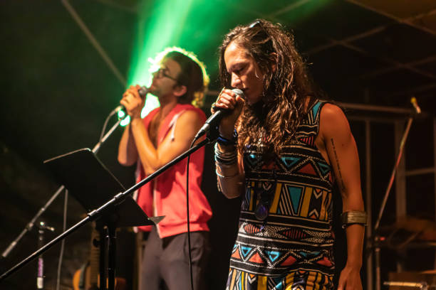 istock woman and man are singing on the stage 1197548364