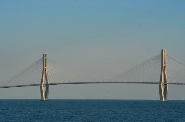 istock Two feature pylons of a bridge in a bay. 1197552370