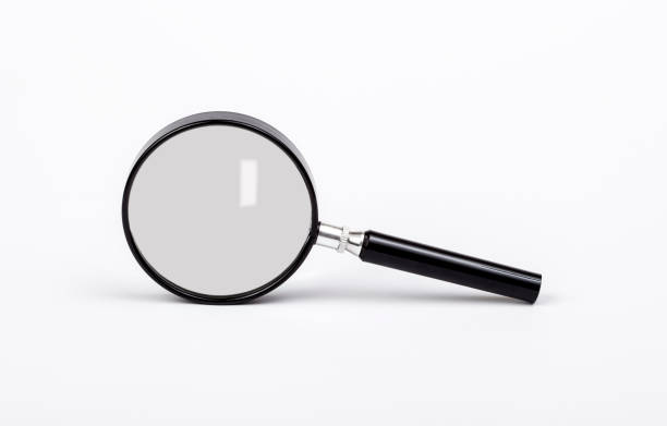 istock magnifying glass isolated on white background 1197553481