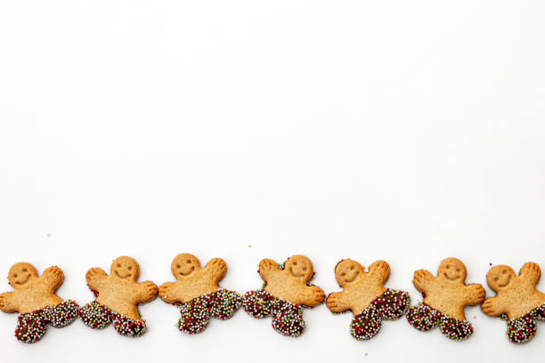 istock Set of smiling gingerbread man cookies isolated on white background 1197555403