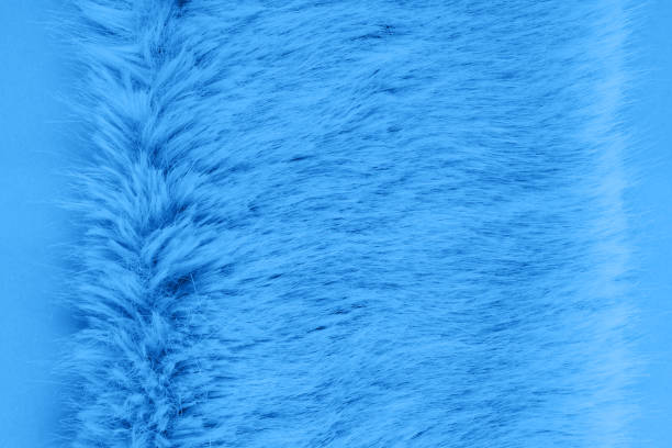 istock Classic blue faux fur background flat lay 1197557303