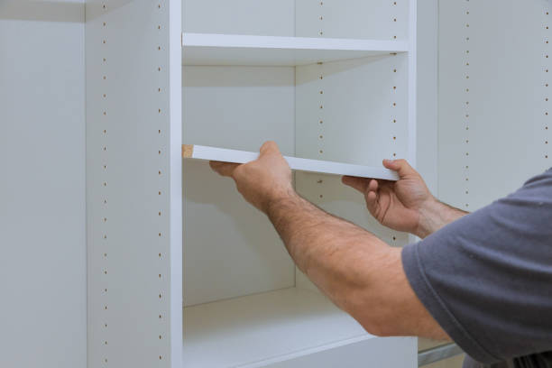 istock Assembling shelves with home a new apartment 1197557572
