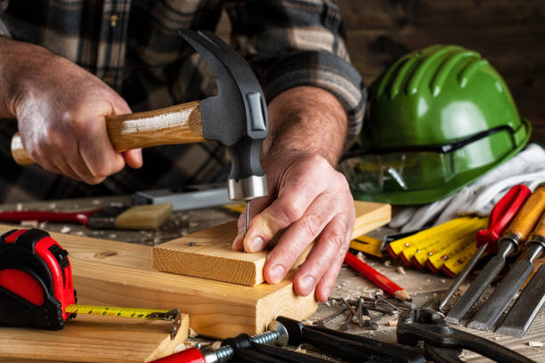istock Carpenter at work on wooden boards. Carpentry. 1197557935