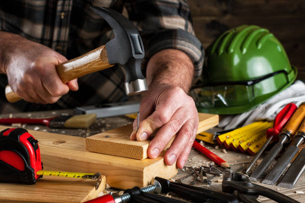 istock Carpenter at work on wooden boards. Carpentry. 1197557940