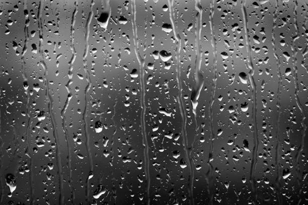 istock Window with rain or water drops from stormy weather 1197563996