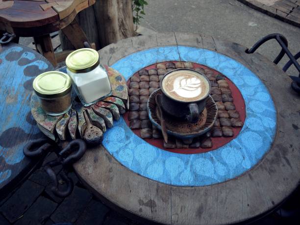 Fresh coffee on an old wooden table, texture background