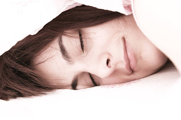 istock Beautiful young woman sleeping. 119756433