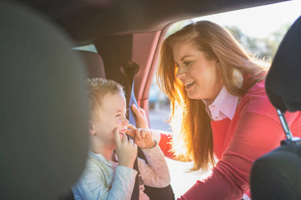 istock Mother with Child in Car 1197572605
