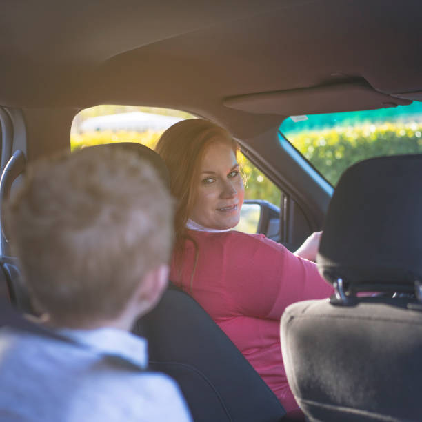 istock Mother with Child in Car 1197572632