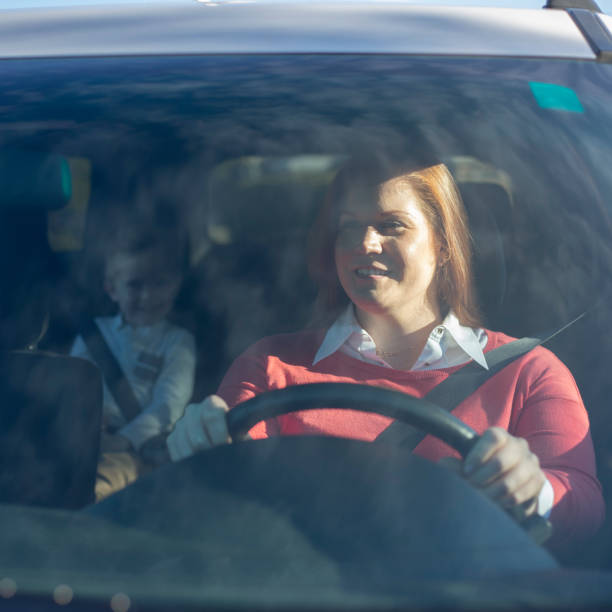 istock Mother with Child in Car 1197572670